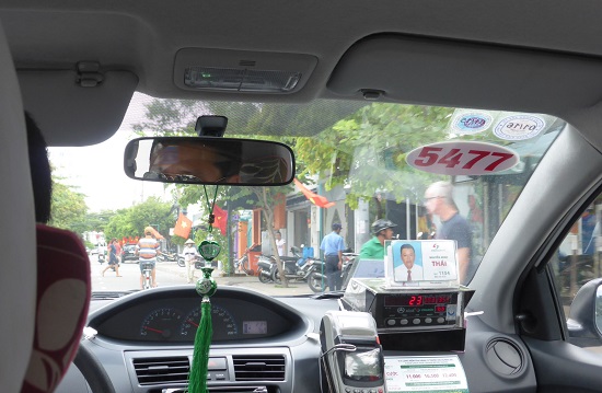 Take a photo of the driver’s information is helpful tips for safe taxi rides in Vietnam