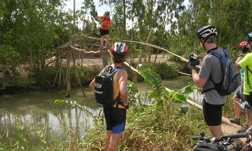 Mekong delta cycling - local monkey bridge