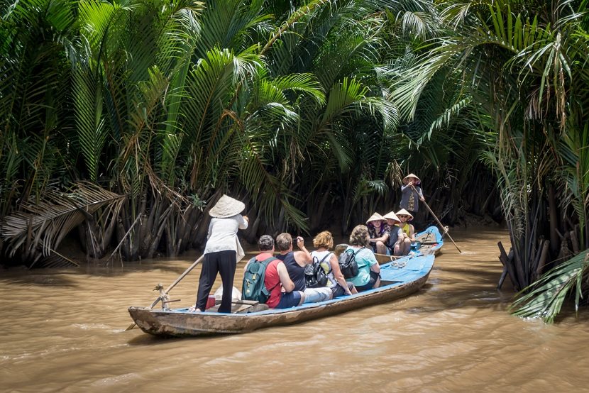 Rowing boat in the Mekong Delta